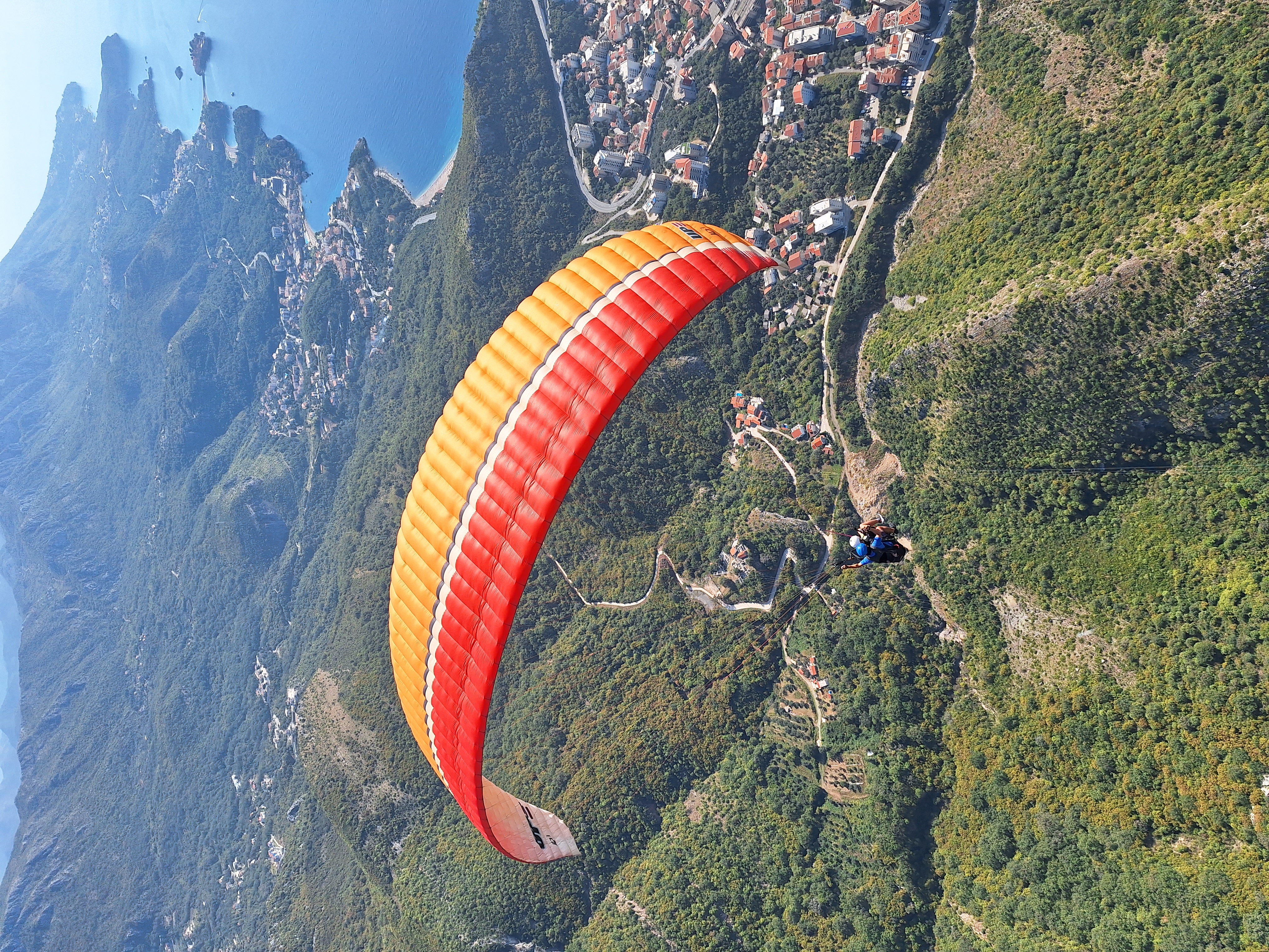 Tandem paragliding flight above Budva, Montenegro